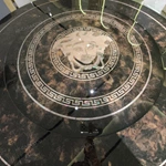 Statement Round Dining Table with Medusa Inlay, Beaded Edge, and Patterned Pedestal